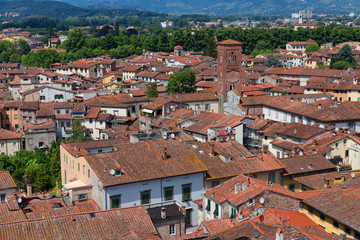 Fototapeta na wymiar Aerial view of the small medieval town of Lucca, Toscana (Tuscany), Italy, Europe. View from the Guinigi tower