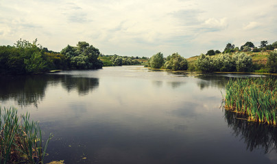 Summer scene with river.River Krasivaya Mecha in Tula region,Russia.