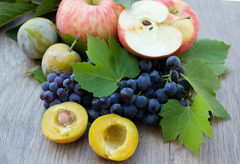 plums with apples and grapes