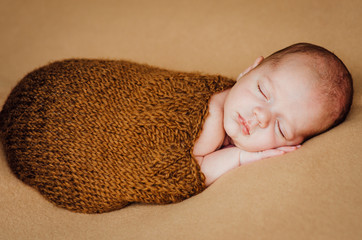 beautiful newborn sleeping baby boy