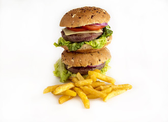 Hamburger meat and vegetables on white background