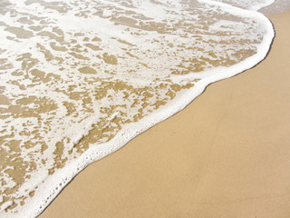 the sea long the shoreline from an Italian beach