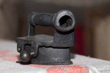 Old retro iron made of iron steel