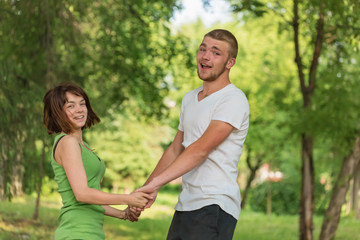 guy and girl holding hands