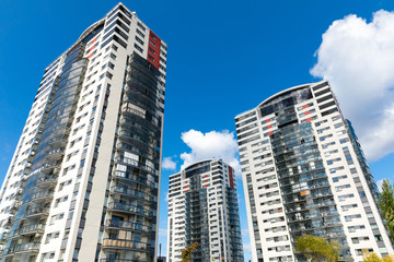 Fototapeta na wymiar modern apartment buildings against blue sky
