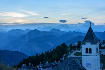 Mountain escape. Panorama from Mount Lussari at sunset