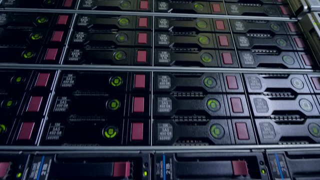 Several levels of a fully packed data cabinet.