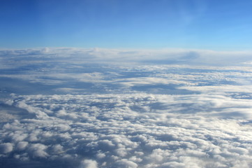 Fototapeta na wymiar Flight over the clouds.