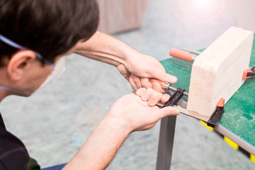Closeup photo of clamp compression tool in workshop