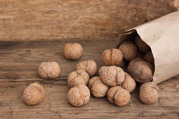 walnuts in a kraft paper bag