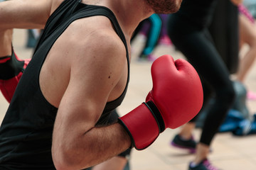 Fitness and Boxing Workout: Boy with Red Gloves