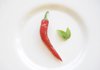 pepper on a white plate