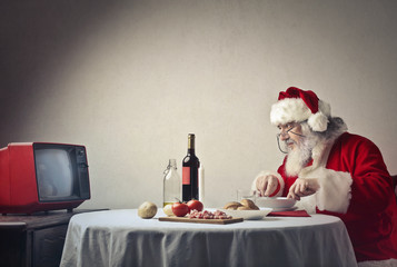 Santa having dinner