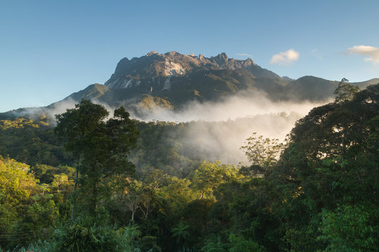 Mountain and blue sky with clouds on the jungle (Mount Kinabalu, Borneo, Malaysia)