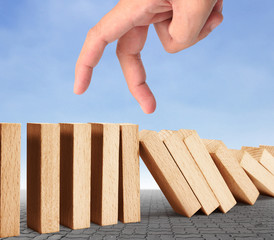 hand stop  dominoes continuous toppled