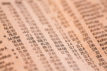 Newspaper illustration with a schedule of the cost of financial shares