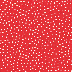 White polka dots seamless pattern on red background. Cute classic white polka dots textile pattern in restrained colours. Seamless scattered confetti fall chaotic decor. Vector illustration.