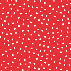 White polka dots seamless pattern on red background. Unusual classic white polka dots textile pattern in restrained colours. Seamless scattered confetti fall chaotic decor. Vector illustration. © Begin Again