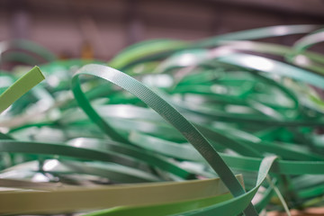 Waste green plastic packaging tape