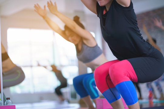 Group of girls to exercise, yoga in the studio