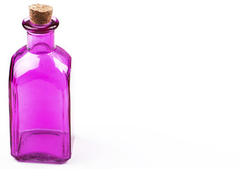 Obraz na płótnie Canvas Glass jar of lilac color on white background. Isolated. Container. Copy space.