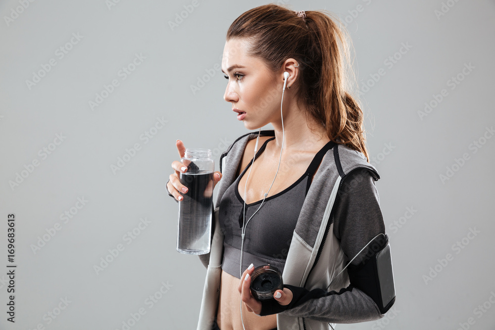 Canvas Prints Side view of attractive sports woman