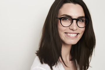 Portrait of gorgeous girl in glasses, studio