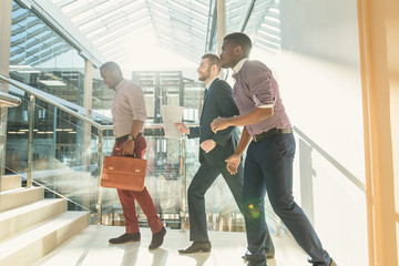 Lively business people running steps.Concept of business competition and racing