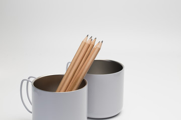 Wood pencil in the cup