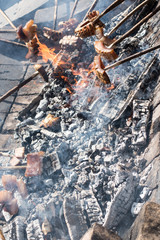 Smoked lard (Slanina), sausages and bread cooked on fire. Cooking in the nature. Romanian traditional food. 