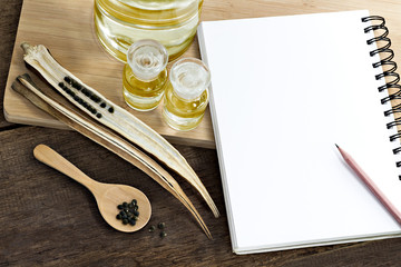 Abelmoschus esculentus, Okra seed and oil with copy space for text.