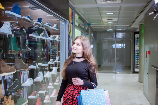 young lady shopper in mall, woman at shopping