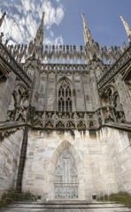 Fototapeta premium upper side facade at Cathedral, Milan, Italy