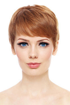 Young beautiful woman with short pixie haircut over white background