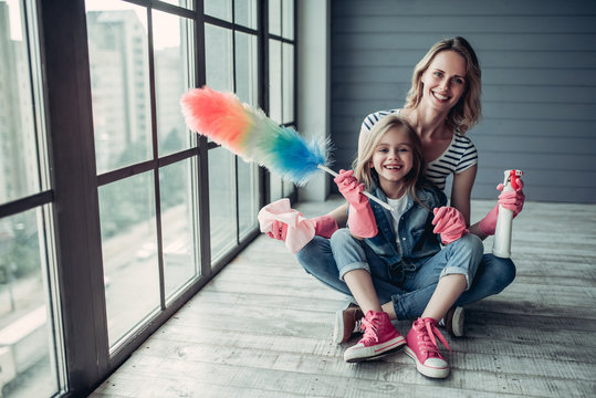 Mom With Daughter Doing Cleaning