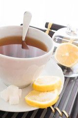 hot tea with lemon and sugar