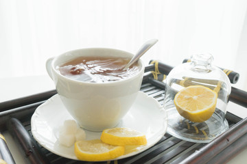 hot tea with lemon and sugar