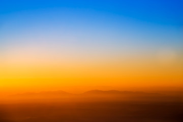 sun rise over a fog and mountain  in Thailand