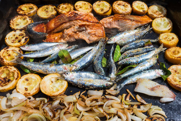 assortiment de poissons et de légumes à la plancha