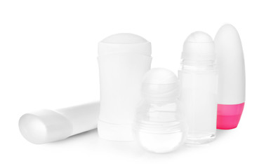 Female deodorants on white background