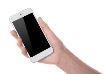 Young woman holding phone on white background