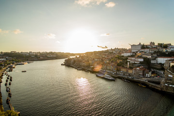 Fototapeta premium Porto, Portugal - July 2017. Panorama of the city of Porto and the river of Douro at sunset. Portugal. Porto popular tourist destination of Europe