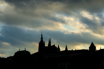Fototapeta na wymiar Prague castle at sunset with menacing skies