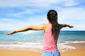 Fototapeta na wymiar Woman happy on beach summer background