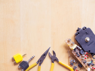 set of electronics and equipment and print circuit board support engineering activity with texture wood background and copy space