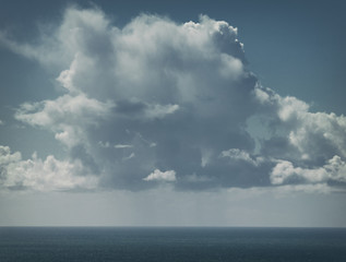 Naklejka na ściany i meble Dramatic Rainy Clouds over Sea