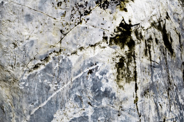 Stripes atop a stone plate looked beautiful,durable, tough, brave fight against sun and rain.