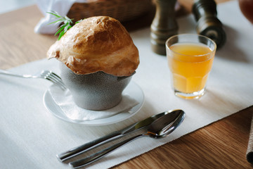Restaurant table with vegetables in a pot.