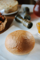 Fresh and hot bread on table