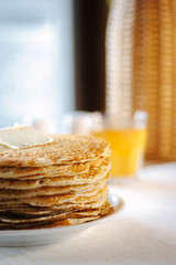 Stack or pile of pancakes at russian restaurant.